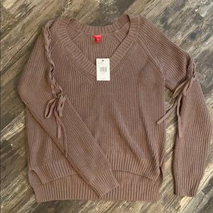 Guess women’s knit sweater with arm braid detail